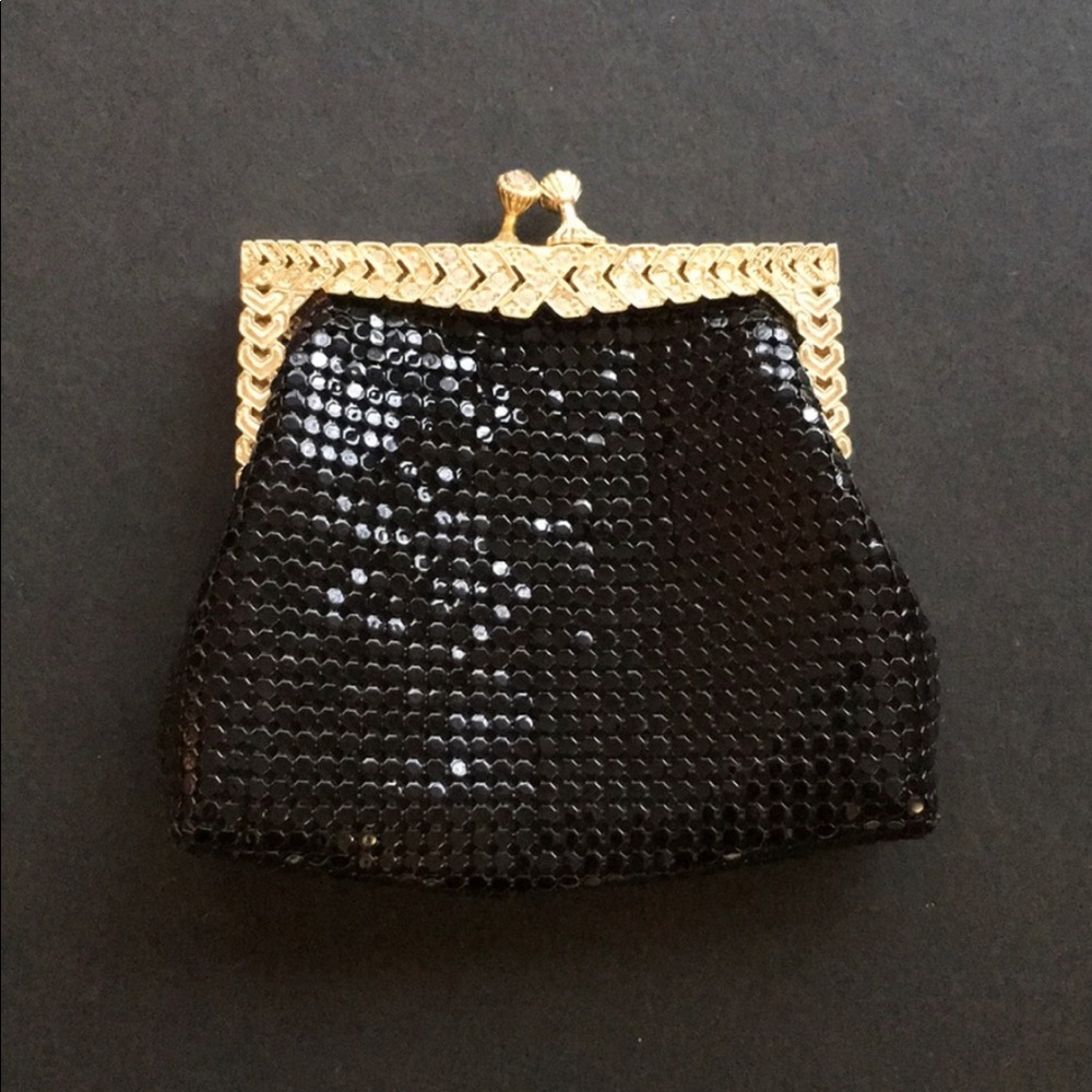 Vintage black gold and diamond coin purse.